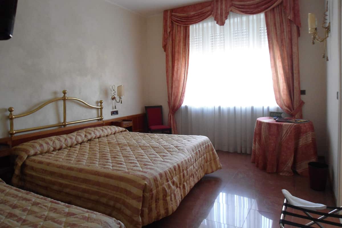 Triple Room | Down comforters, minibar, in-room safe, individually furnished
