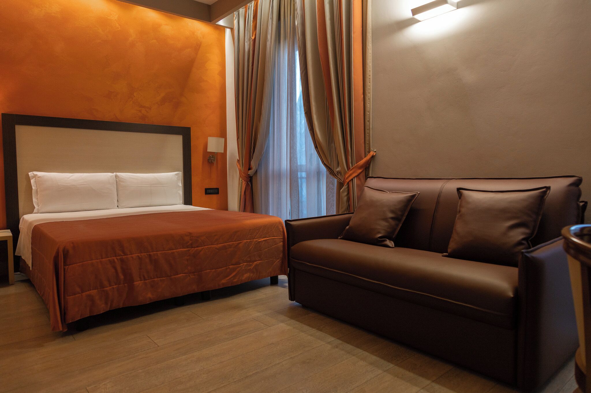 Junior Suite | Down comforters, minibar, in-room safe, individually furnished