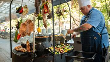 Breakfast, lunch, dinner served; international cuisine, garden views