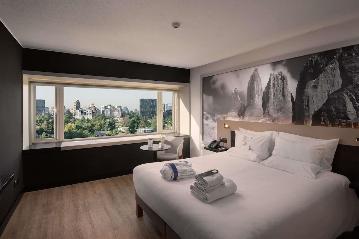 Premium bedding, pillow-top beds, minibar, in-room safe