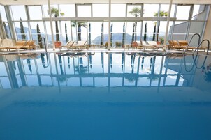 Indoor pool, open 6:00 AM to 9:30 PM, sun loungers