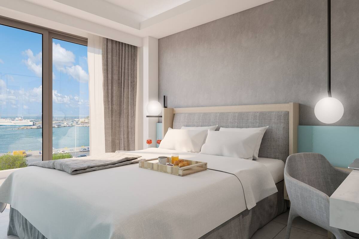 Double or Twin Sea View | Minibar, in-room safe, desk, laptop workspace