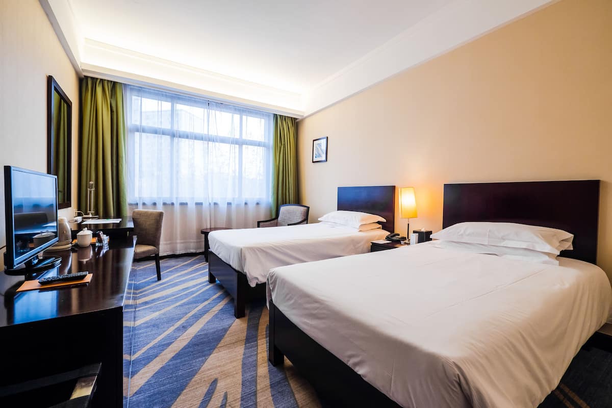 Superior Room | Minibar, desk, blackout drapes, iron/ironing board