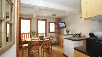 1-inch flat-screen TV with digital channels, TV