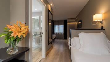 Ropa de cama de alta calidad y minibar