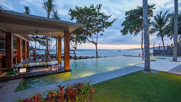 3 bars/lounges, 2 poolside bars, swim-up bar