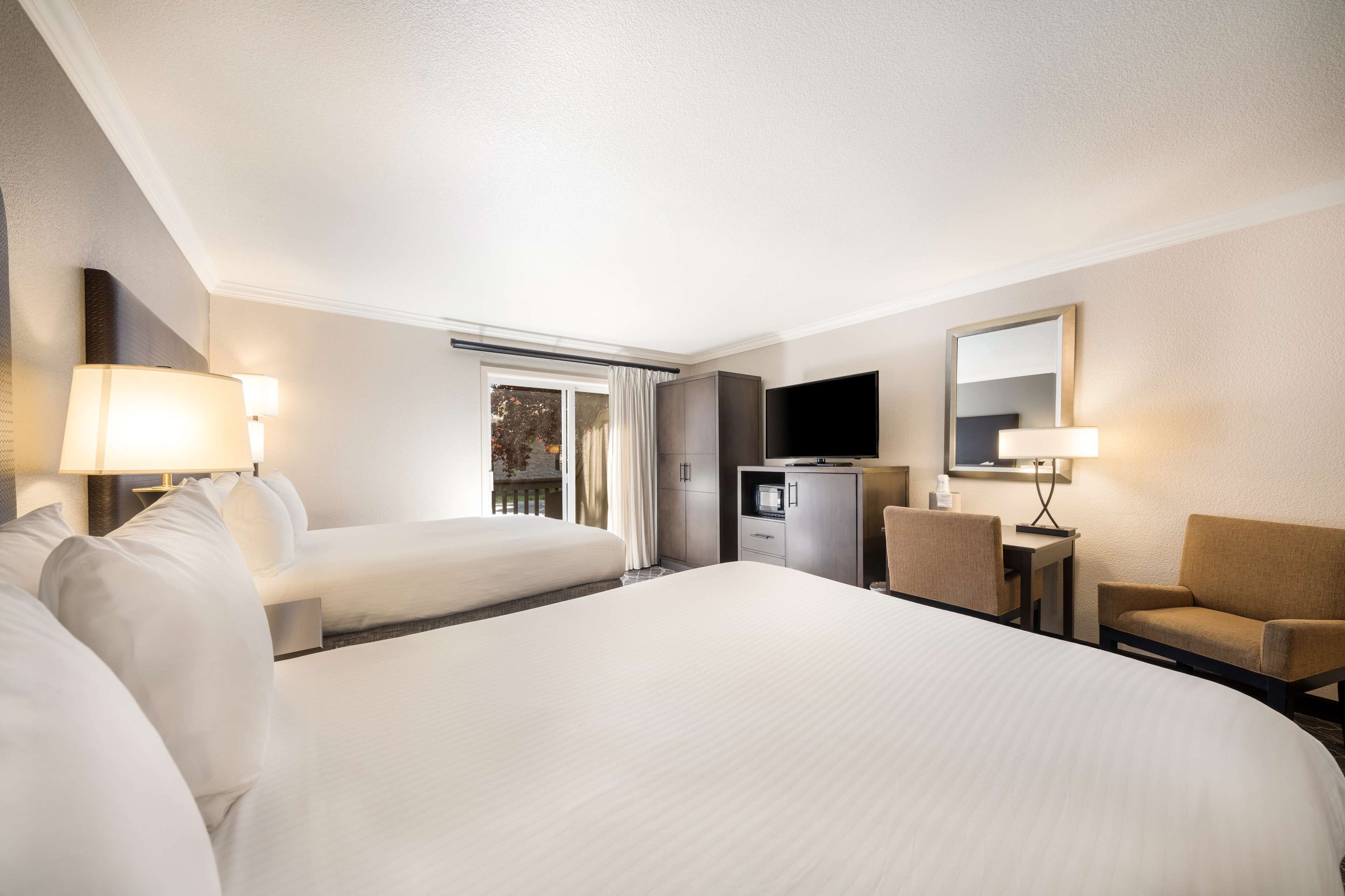 standard room, 2 queen beds, non smoking, patio (not pet friendly) | in-room safe, desk, laptop workspace, blackout curtains