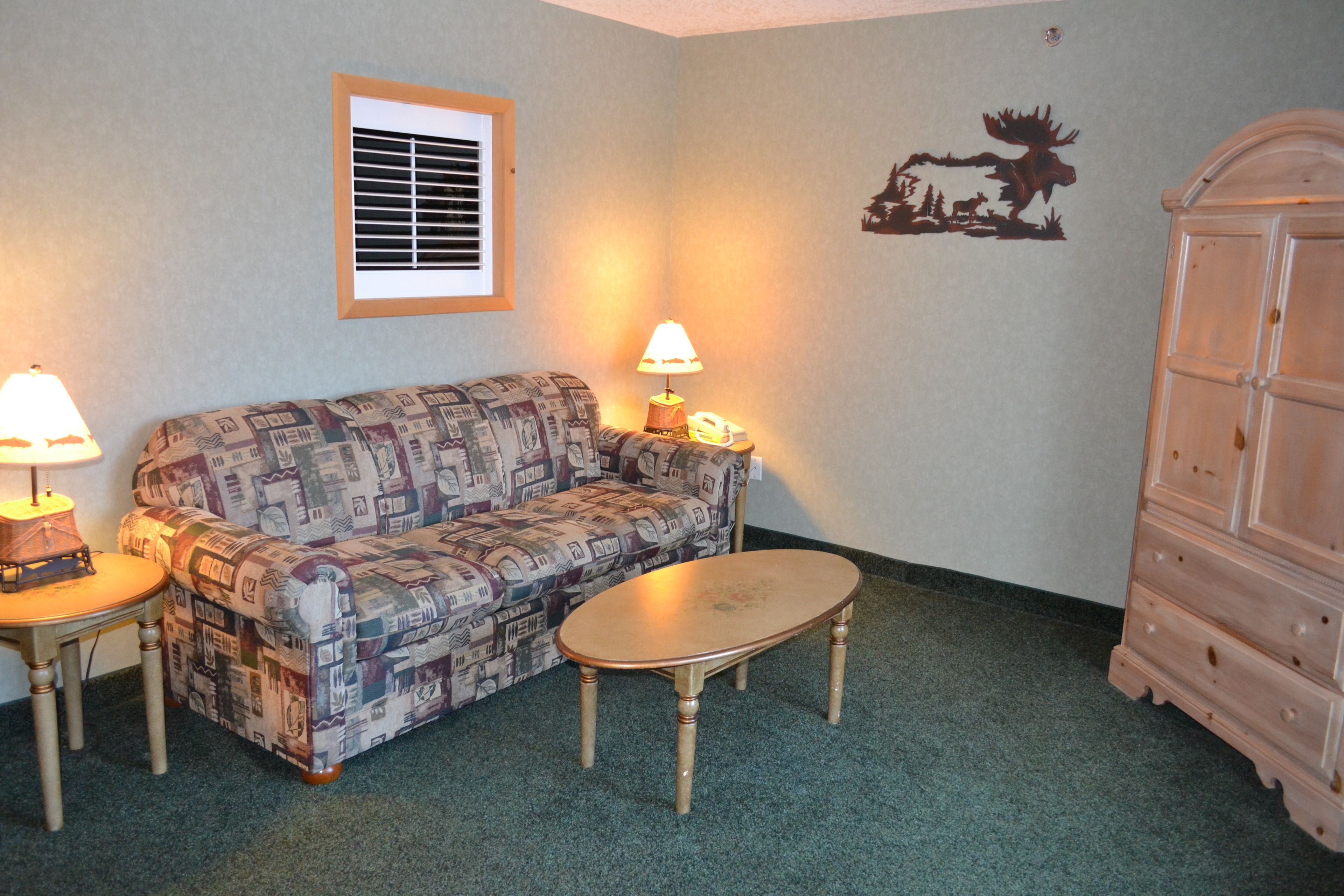 suite, 2 bedrooms, river view | living area | tv