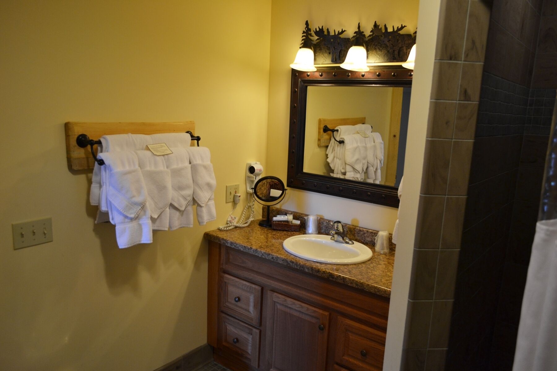 family suite, multiple beds, river view | bathroom | free toiletries, hair dryer, towels