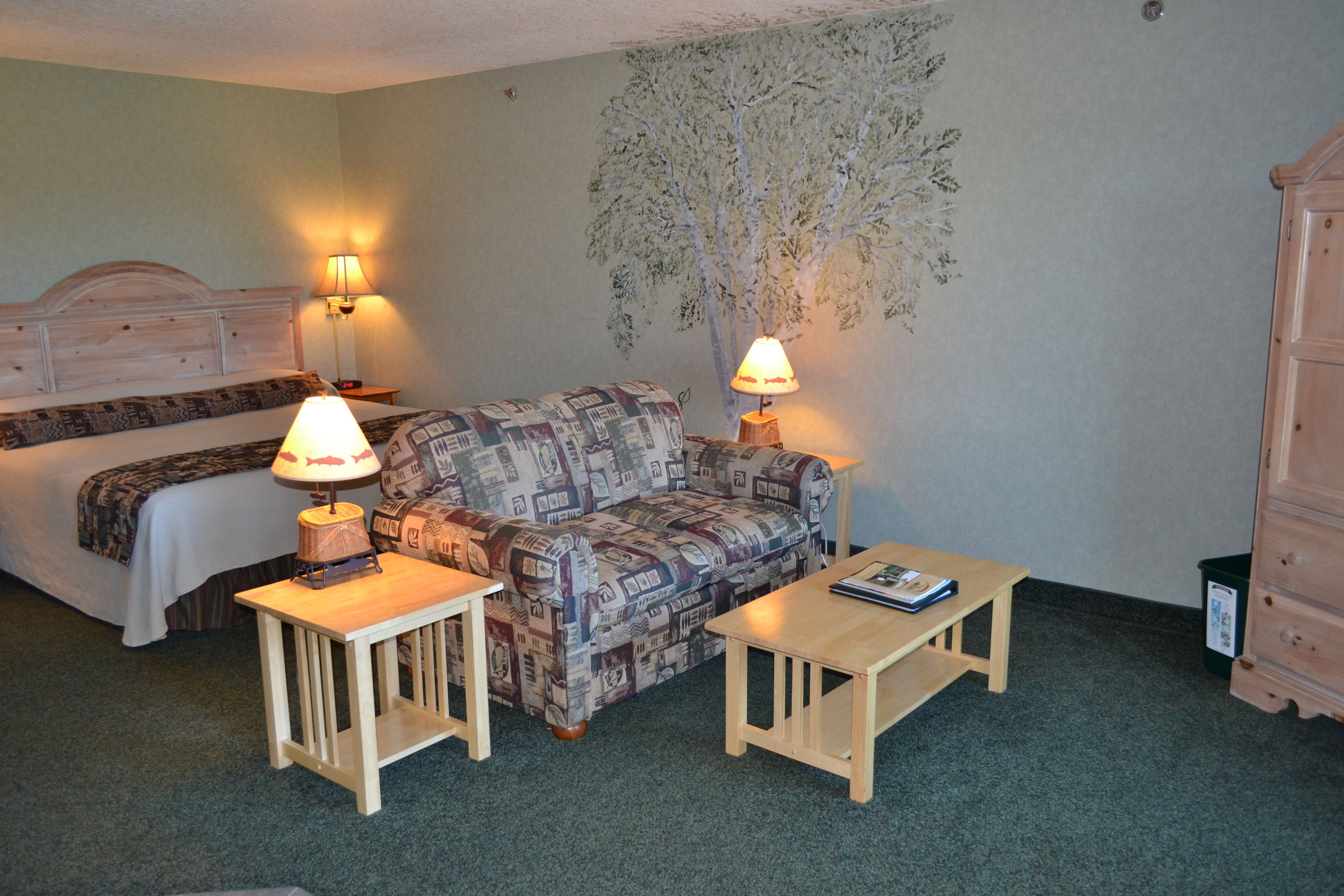 suite, 2 bedrooms, river view | living area | tv