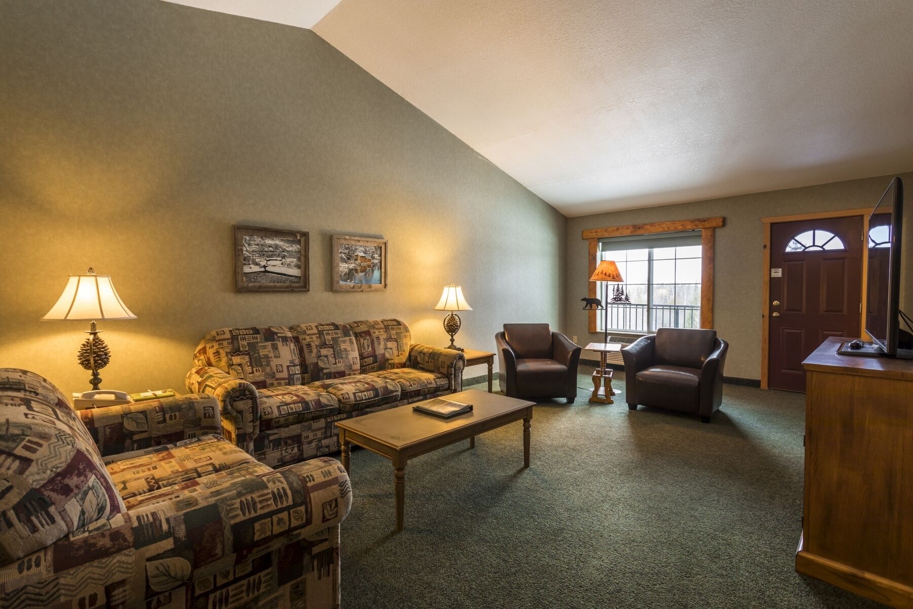 suite, 2 bedrooms, river view | living area | tv