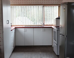 Two Bedroom Unit | Private kitchen | Stovetop, electric kettle, toaster - Larchwood Motel (Hanmer Springs)