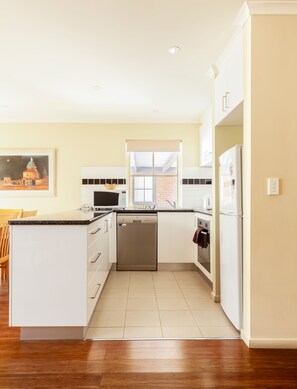 Three Bedroom Apartment | Private kitchen | Coffee/tea maker, electric kettle, toaster, dining tables