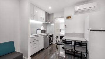 Two Bedroom Apartment | Living area | 42-inch LED TV with digital channels, streaming services, offices