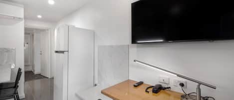 42-inch LED TV with digital channels, streaming services, offices