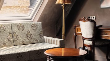 Junior Suite | Living area | 30-inch flat-screen TV with digital channels
