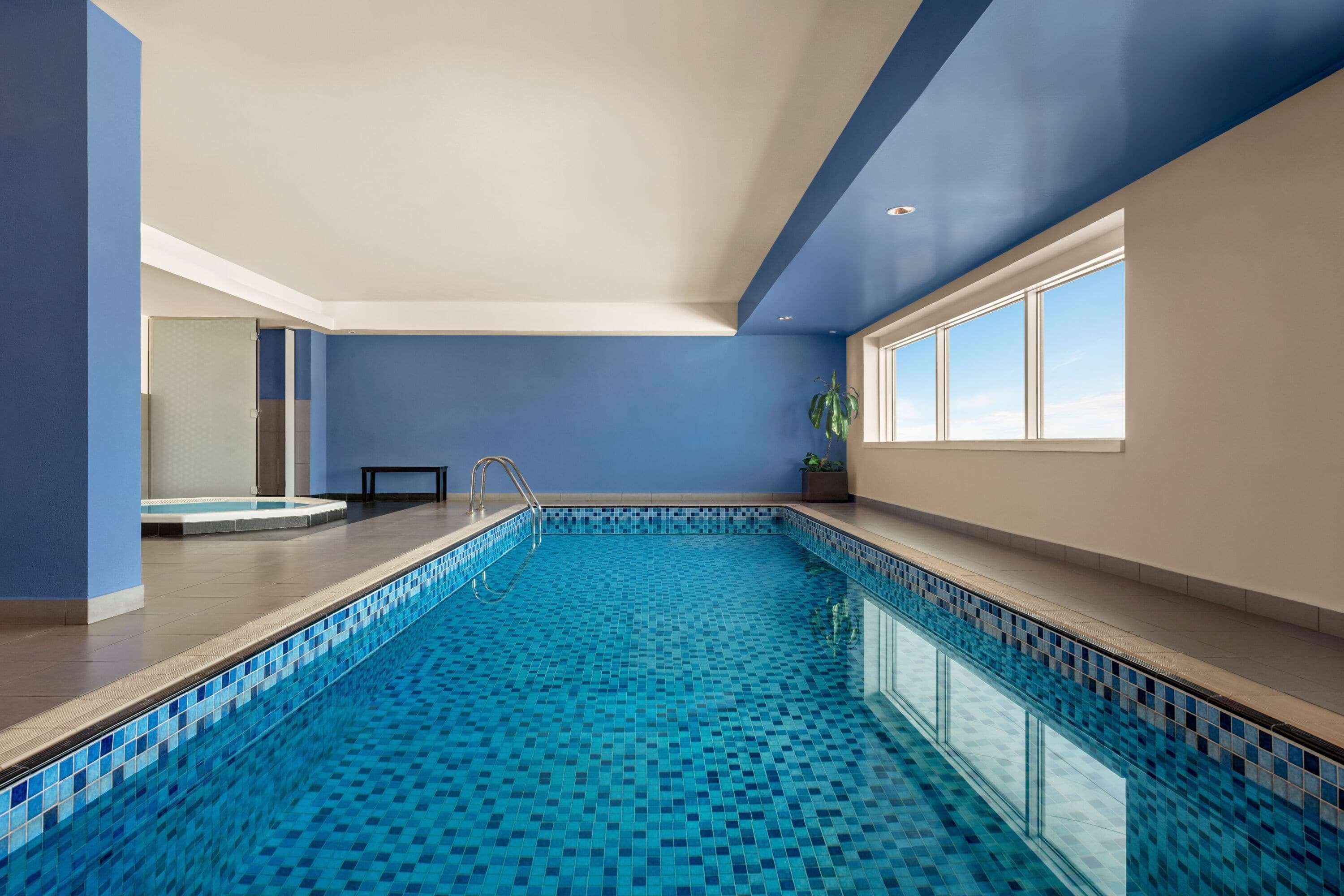 Indoor pool, open 9:00 AM to 8:00 PM, lifeguards on site