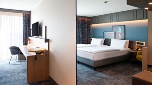 Hypo-allergenic bedding, desk, laptop workspace, blackout drapes