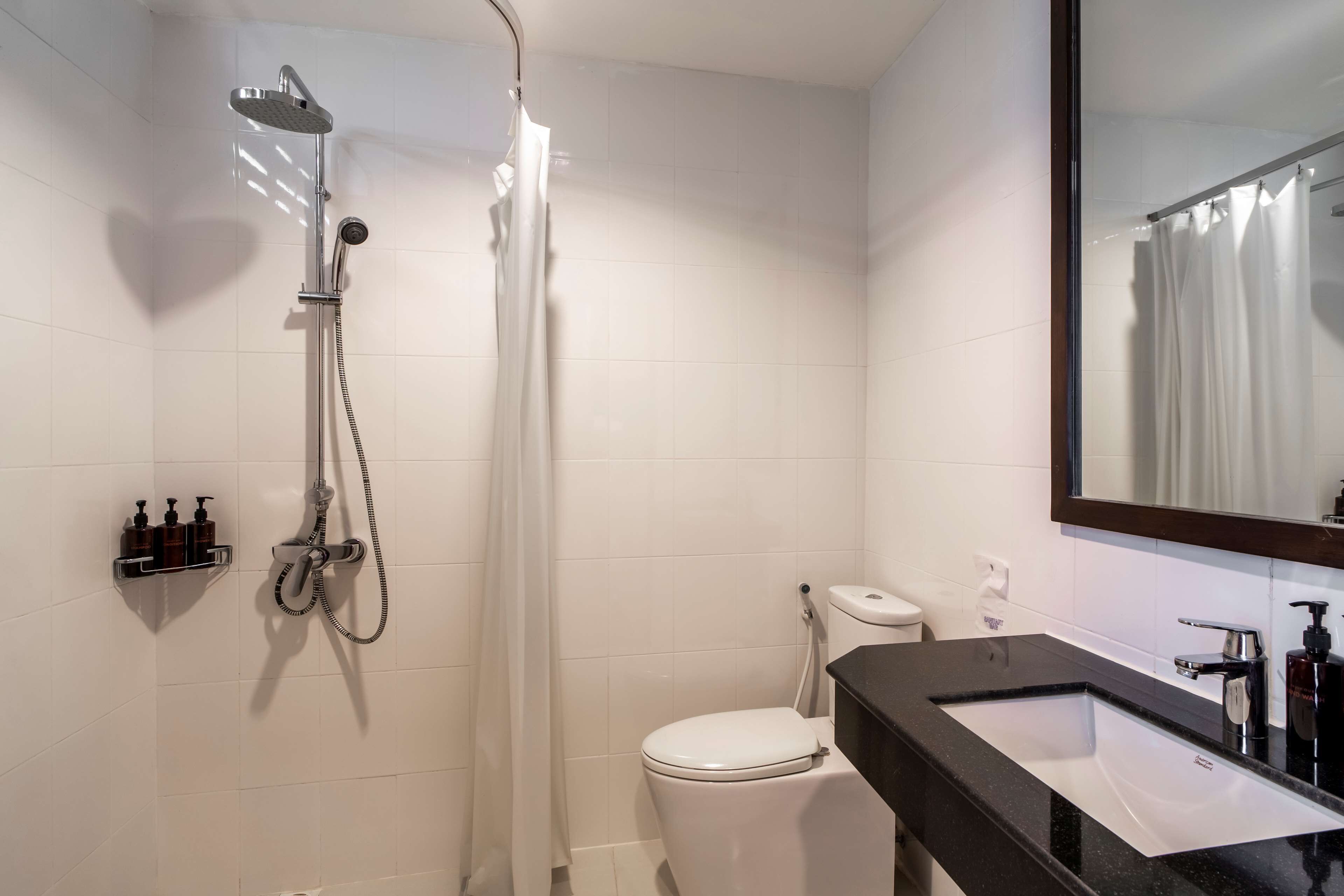 family room, 1 king bed, non smoking, oceanfront (with sofabed) | bathroom | shower, free toiletries, hair dryer, bidet