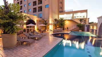 Outdoor pool, pool umbrellas, sun loungers