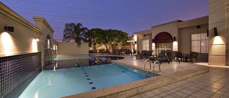 Outdoor pool, pool umbrellas, sun loungers