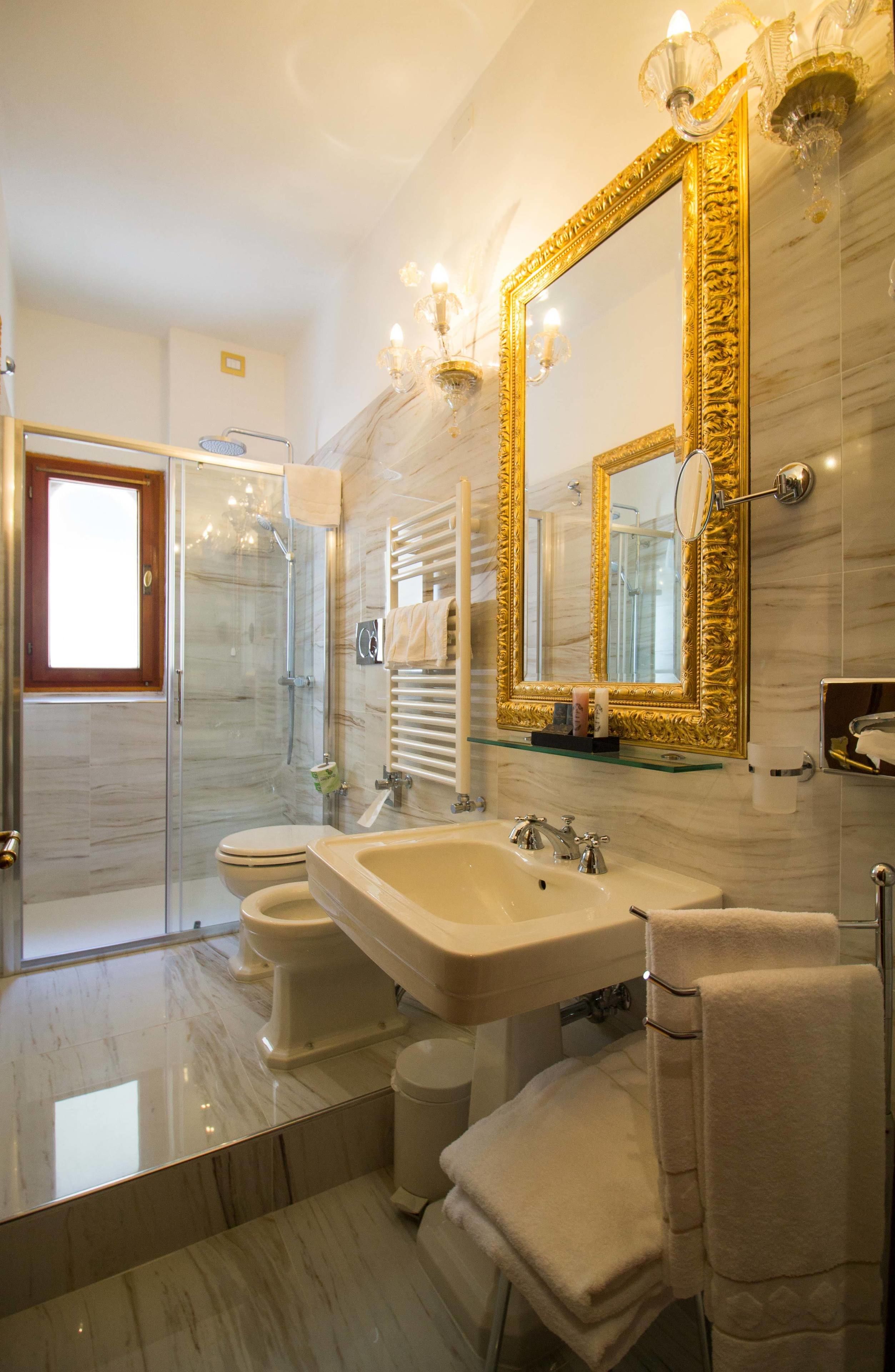 junior suite | bathroom | free toiletries, hair dryer, bathrobes, slippers