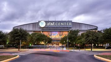 A large, modern building with a prominent 'at&t center' sign.