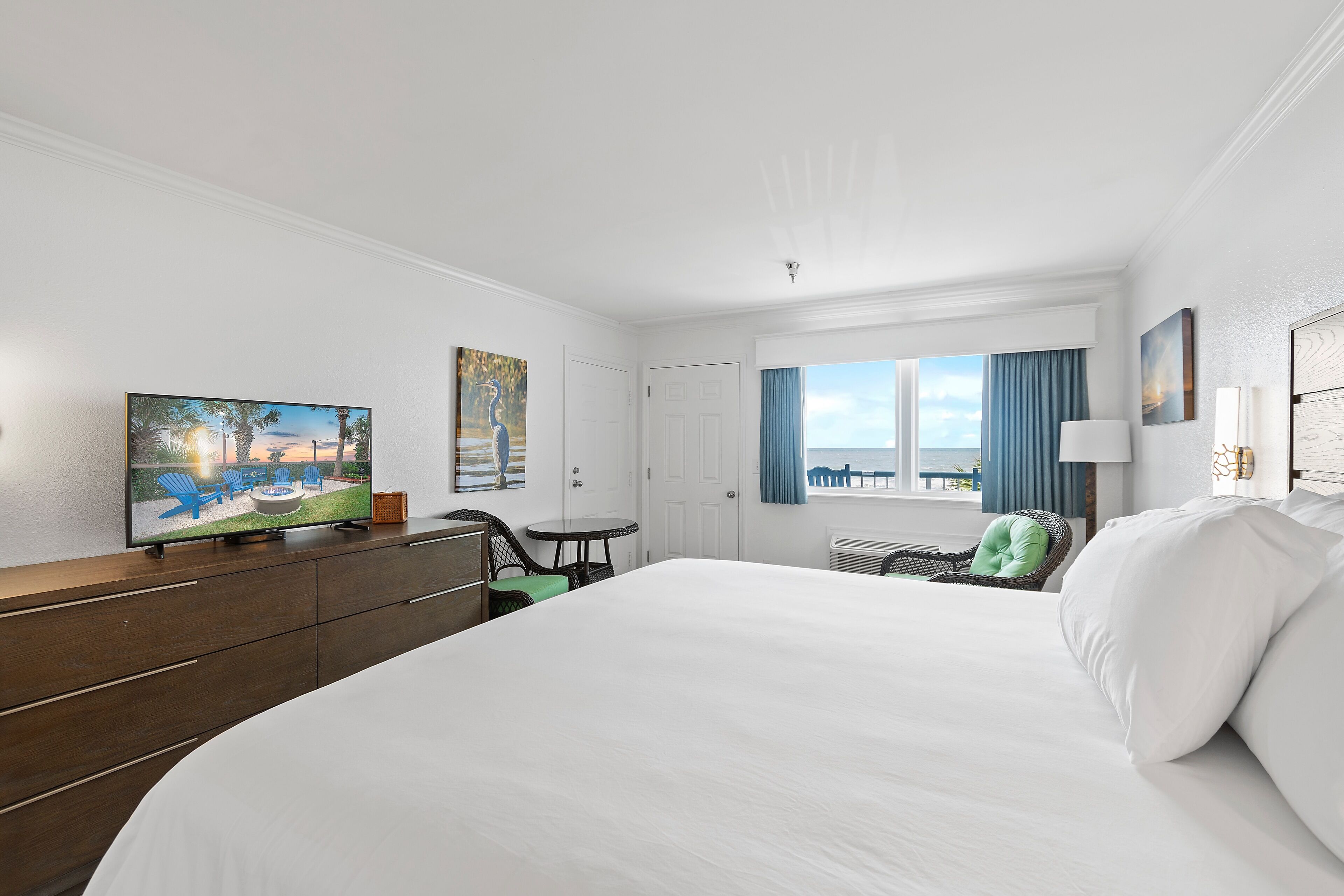 oceanfront king bed | premium bedding, blackout curtains, iron/ironing board, free wifi