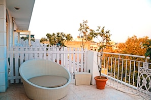 Suite with Airport Pickup | Balcony