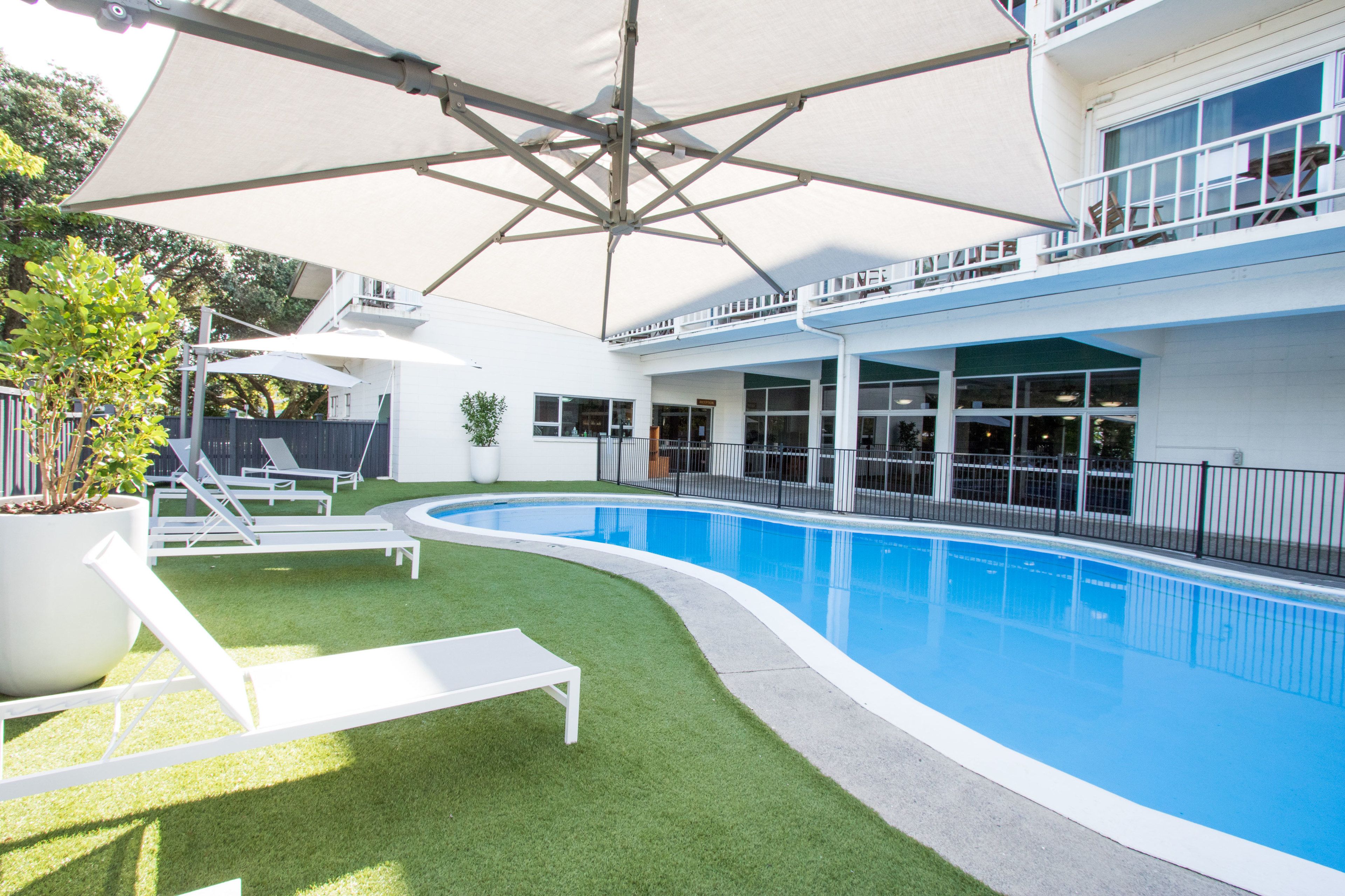 Outdoor pool, open 9:00 AM to 9:00 PM, pool umbrellas, pool loungers