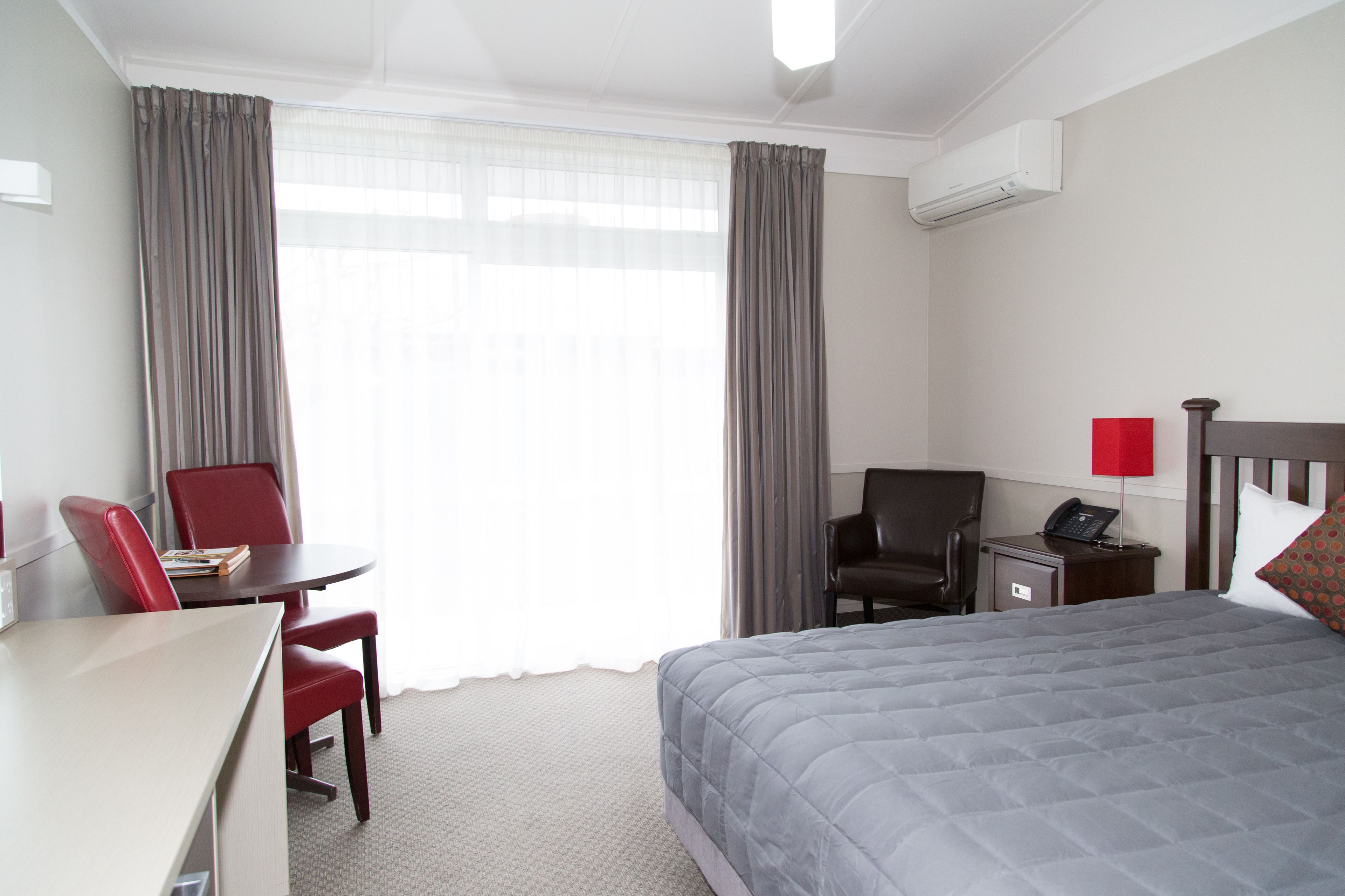 deluxe room, 1 king bed | premium bedding, desk, iron/ironing board, free wifi