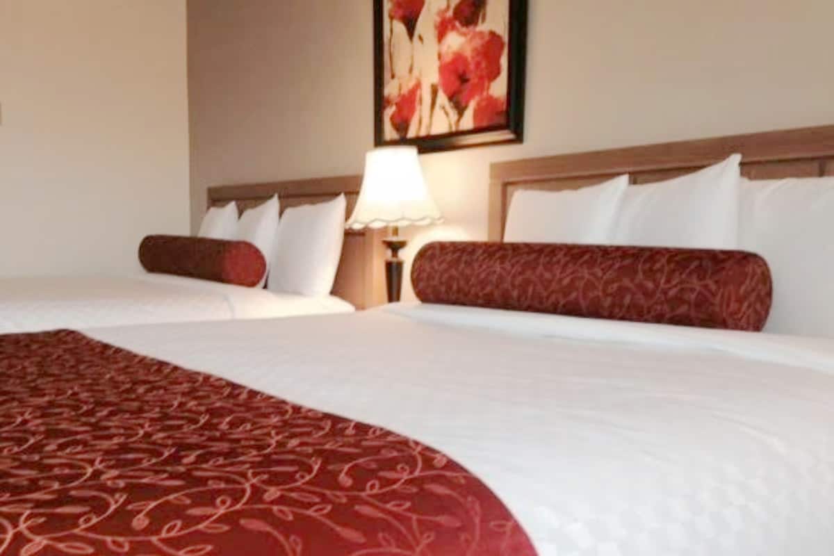 Royal Room, 2 Queen Beds | Desk, blackout drapes, soundproofing, iron/ironing board