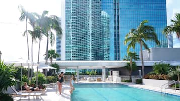 Outdoor pool, open 7:00 AM to 7:00 PM, pool umbrellas, pool loungers
