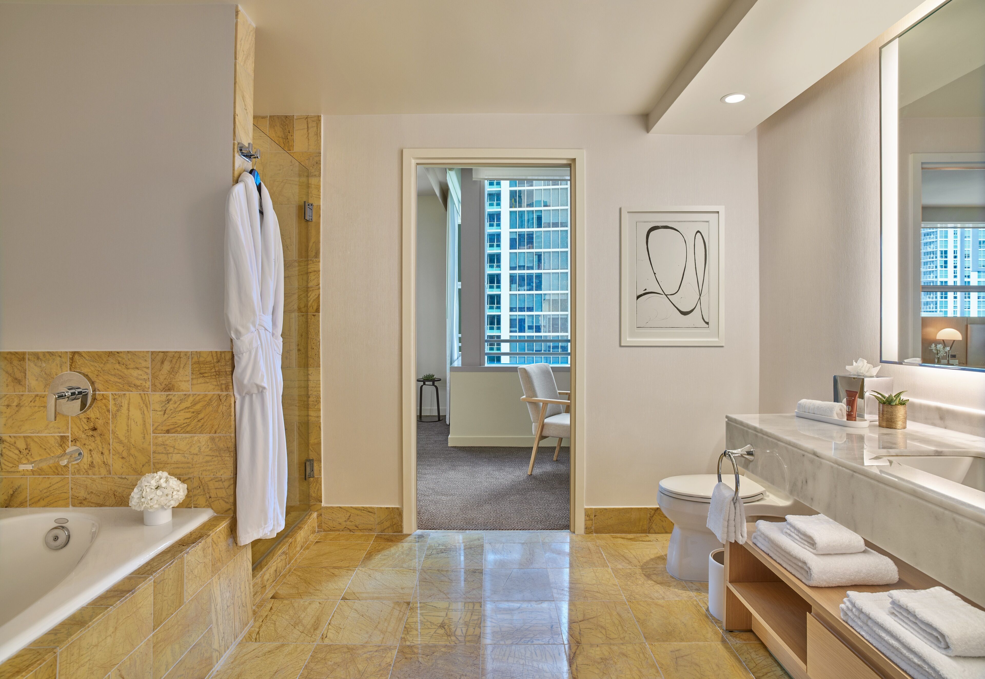 separate bathtub and shower, deep-soaking bathtub, designer toiletries