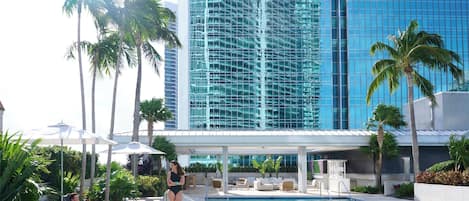 Outdoor pool, open 7:00 AM to 7:00 PM, pool umbrellas, pool loungers