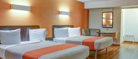 Desk, blackout drapes, iron/ironing board, free cribs/infant beds