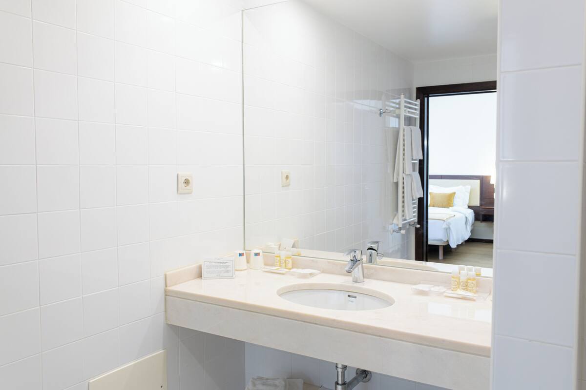 double or twin room | 1 bedroom, in-room safe, desk, blackout curtains