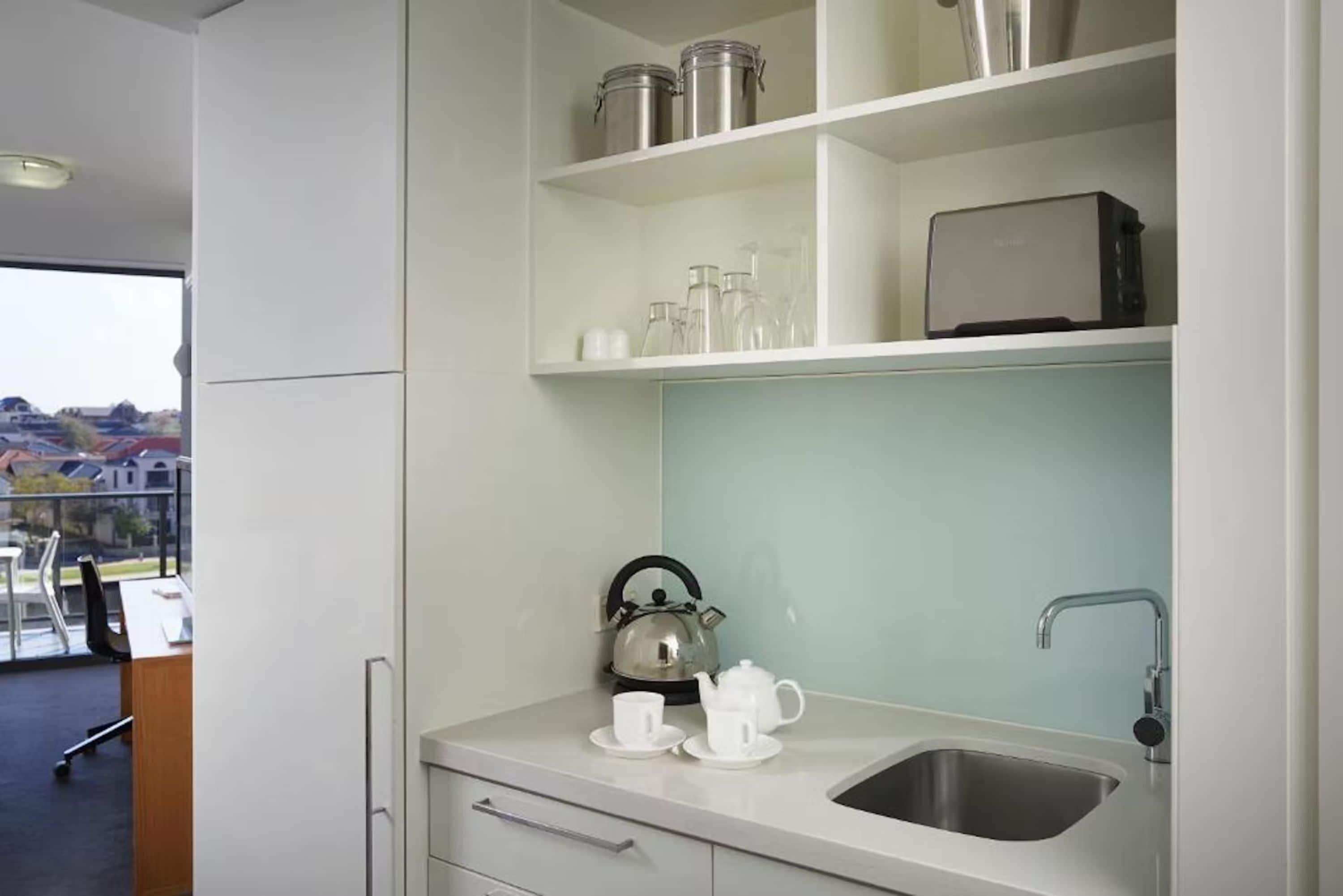 fridge, microwave, toaster, cookware/dishes/utensils