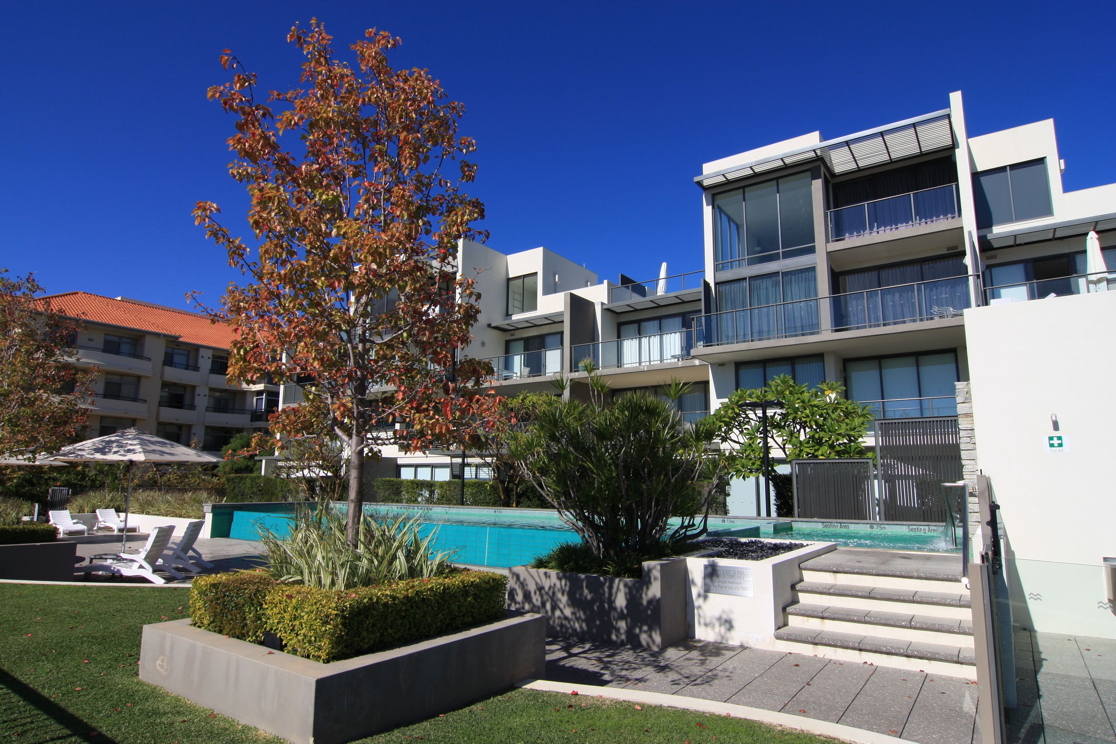 Outdoor pool, pool umbrellas, sun loungers