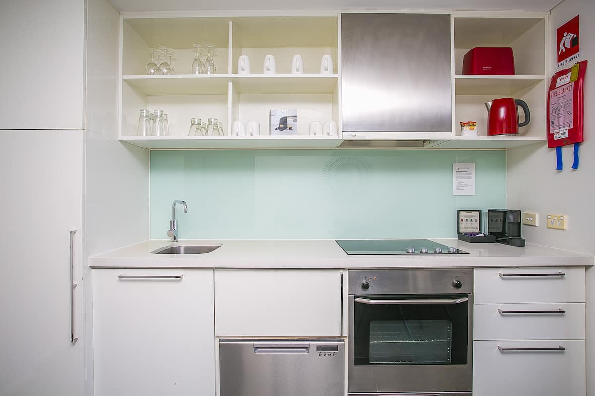 superior apartment | in-room safe, desk, laptop workspace, blackout curtains