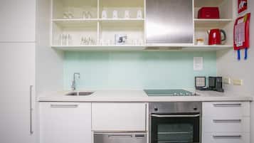 Departamento superior | 1 habitación, caja de seguridad en la habitación y escritorio