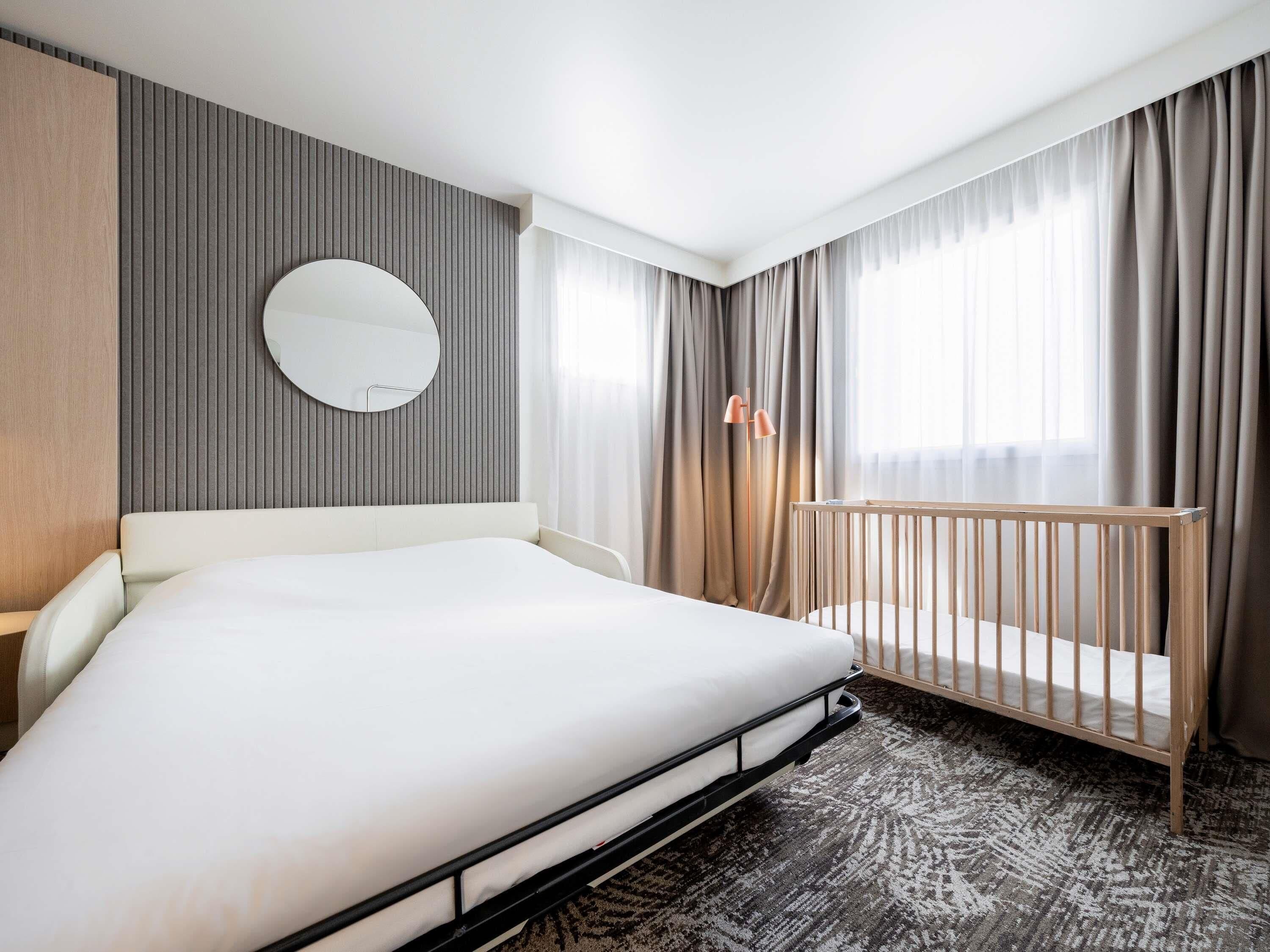 Chambre exécutive, 1 grand lit et 1 canapé-lit | Minibar, coffre-fort pour ordinateur portable, décor unique
