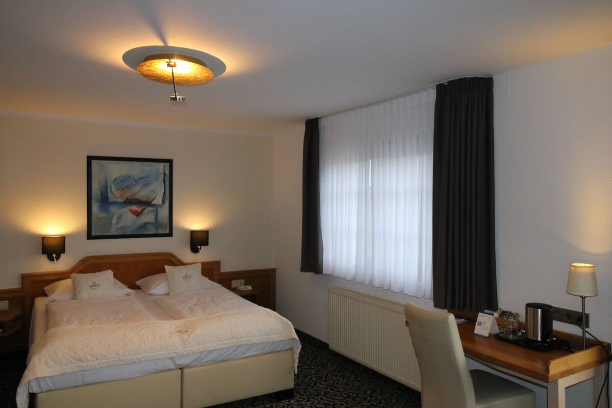 Suite junior | Ropa de cama de alta calidad, camas con pillow-top y minibar 