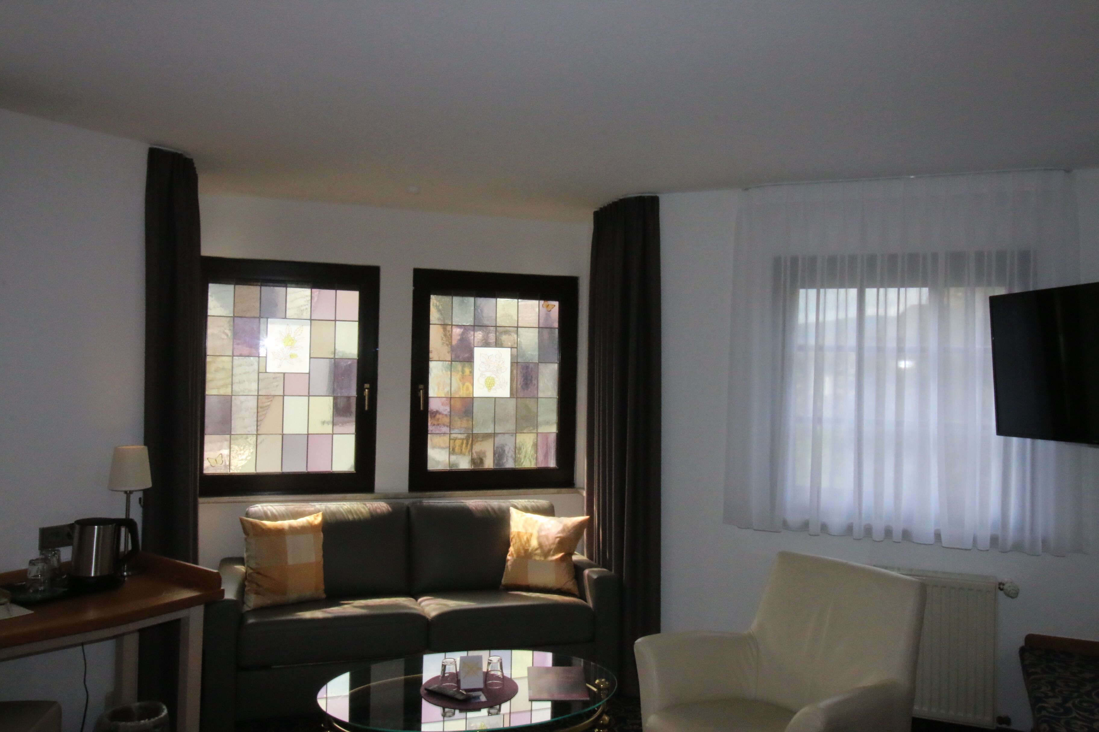 junior suite | living area | 42-inch smart tv with cable channels, netflix, streaming services