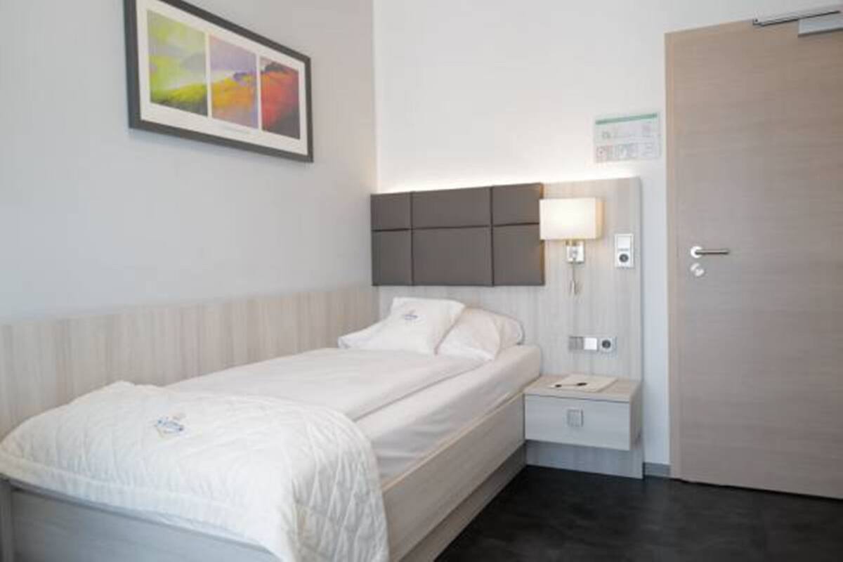 Habitación individual estándar | Ropa de cama de alta calidad, camas con pillow-top y minibar 