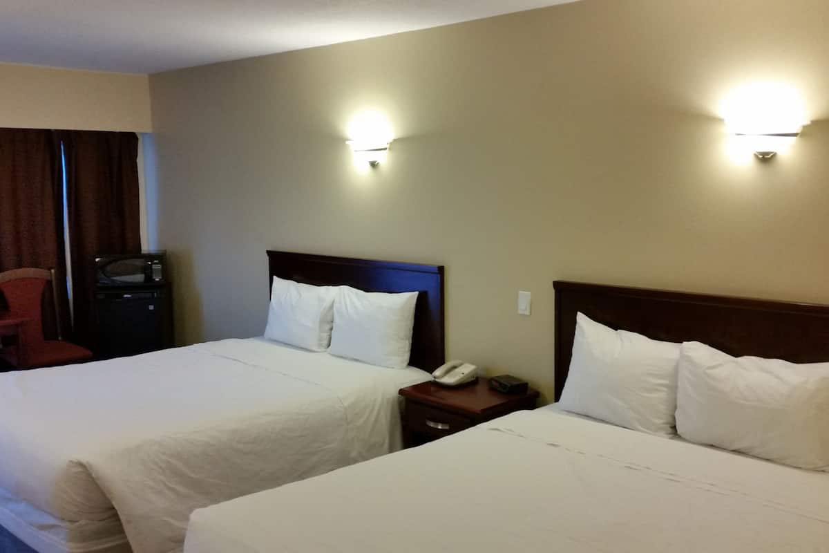 Standard Room, 2 Queen Beds | Iron/ironing board, free WiFi, bed sheets