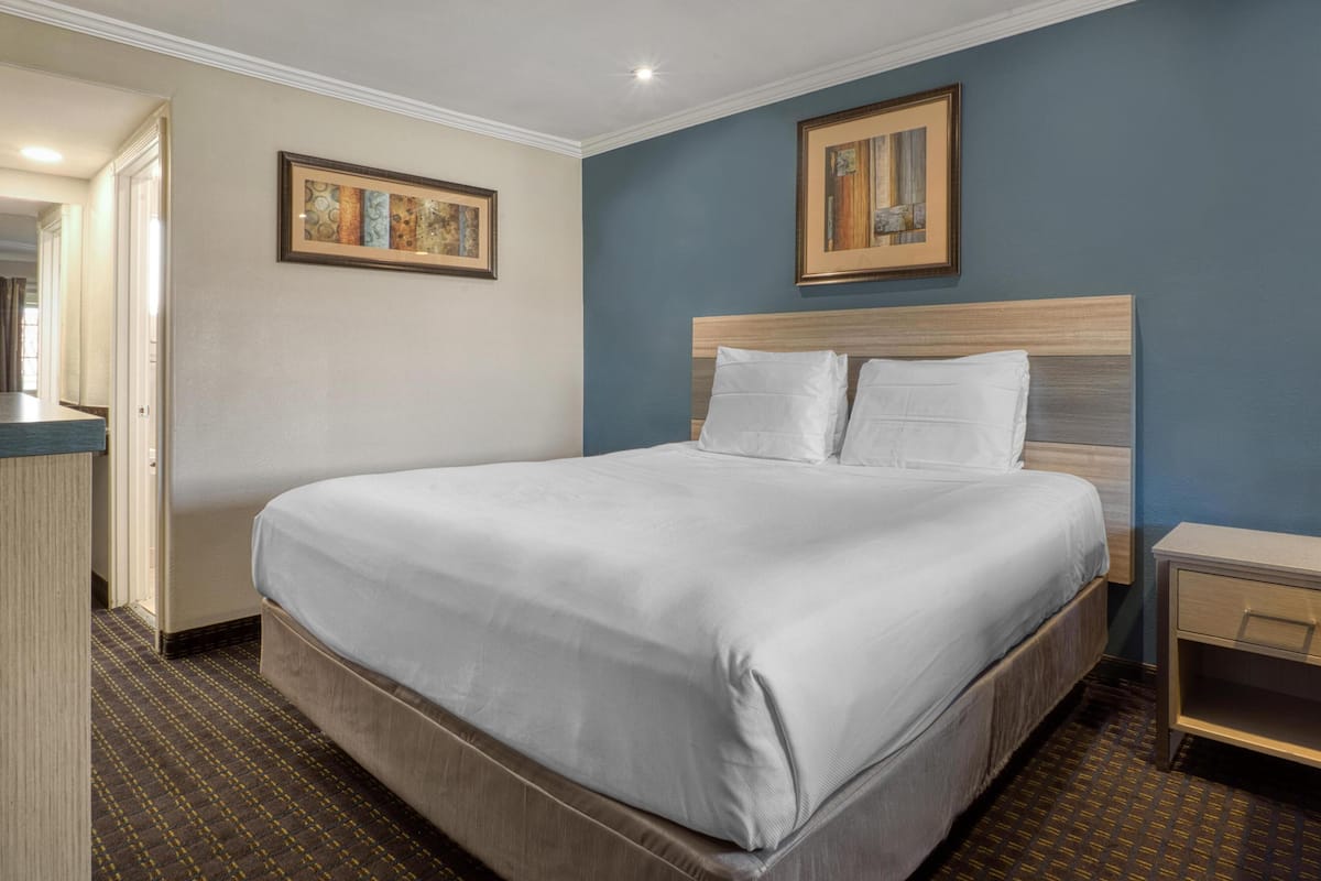 Suite, 2 Queen Beds, Non Smoking, Refrigerator & Microwave | Desk, blackout drapes, iron/ironing board, free cribs/infant beds