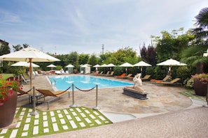 Indoor pool, seasonal outdoor pool, pool umbrellas, sun loungers
