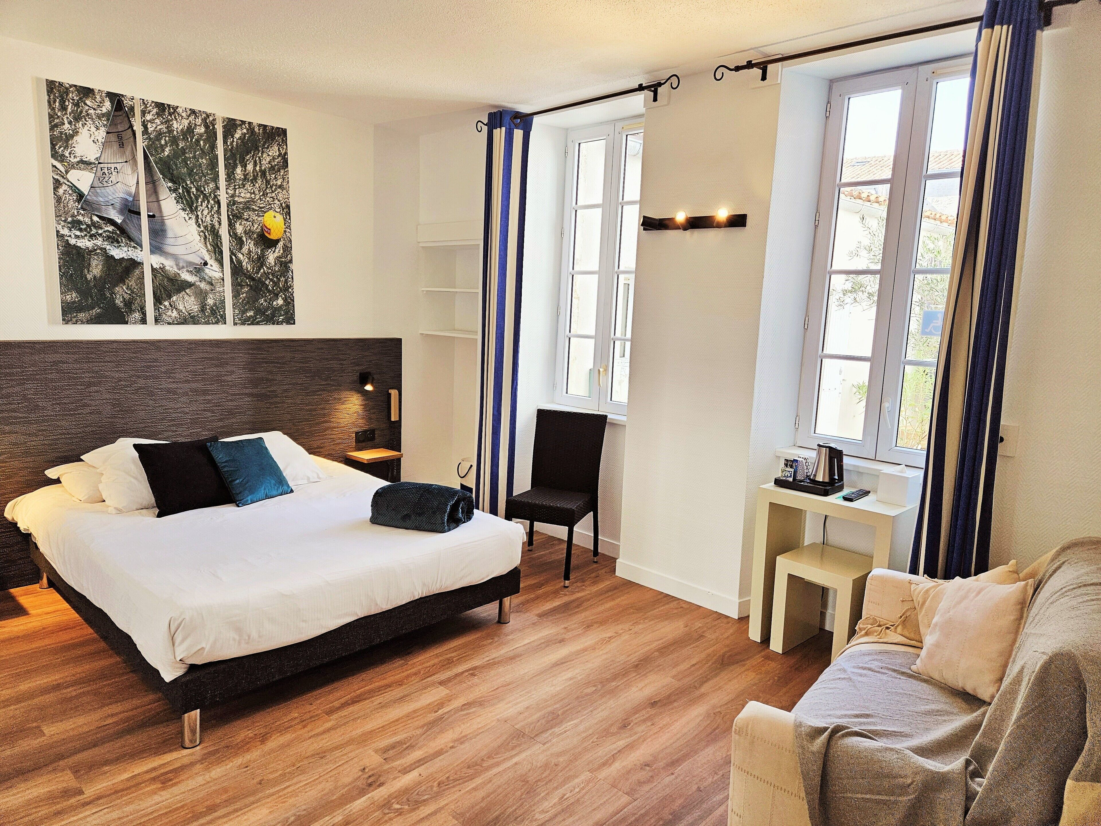 Desk, blackout curtains, soundproofing, iron/ironing board