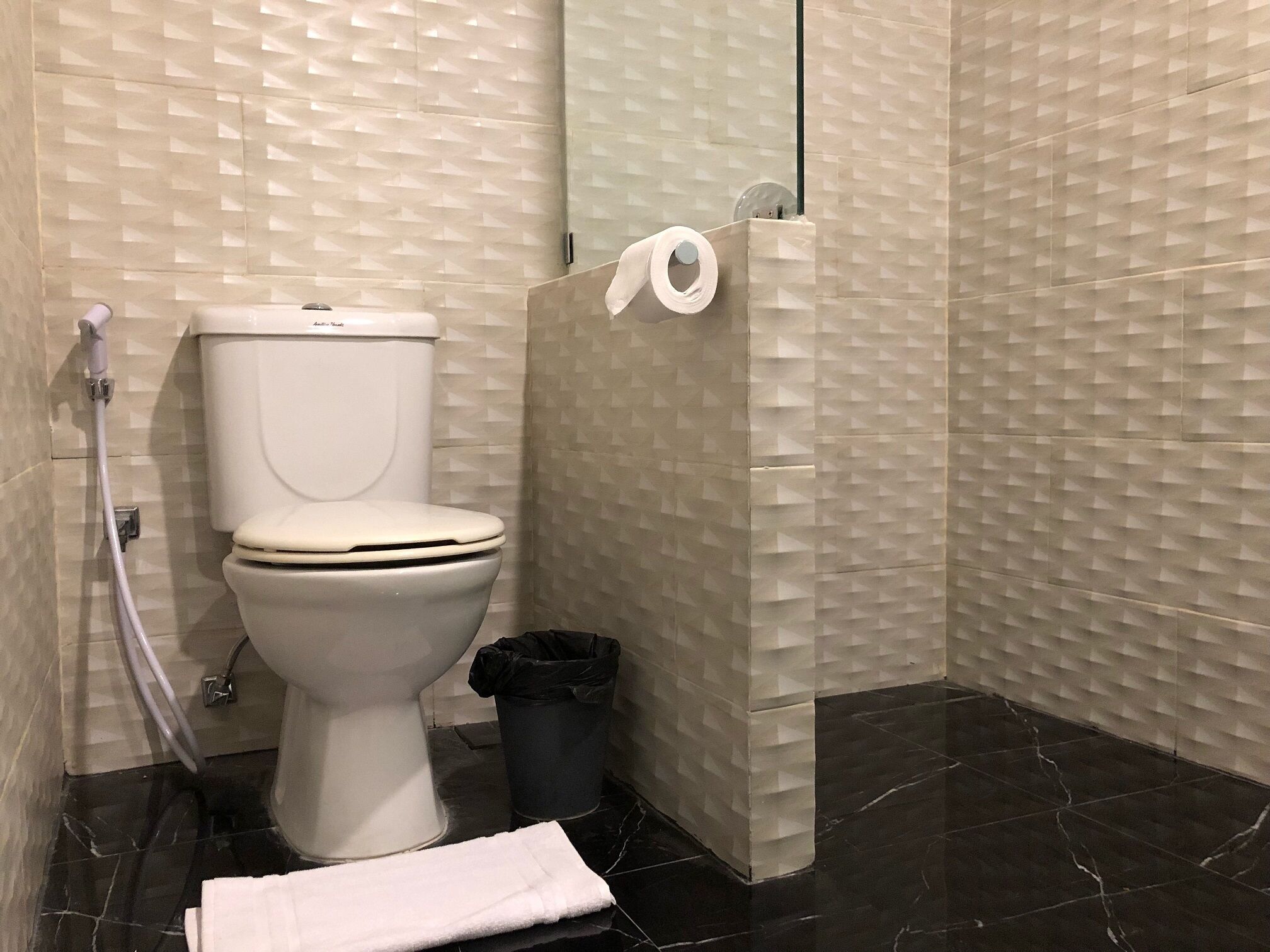 shower, free toiletries, slippers, towels